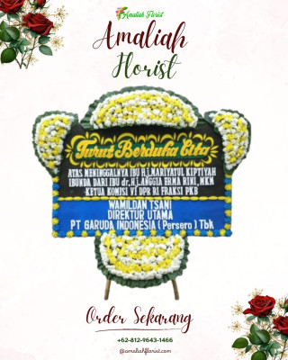 Papan Bunga Duka di Amen