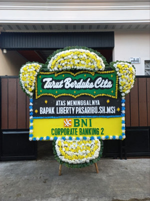 Papan Bunga Duka di Amen