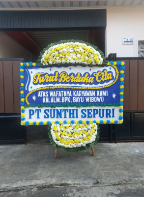 Papan Bunga Duka di Amen