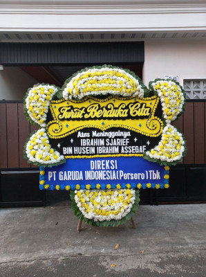 Papan Bunga Duka di Amen